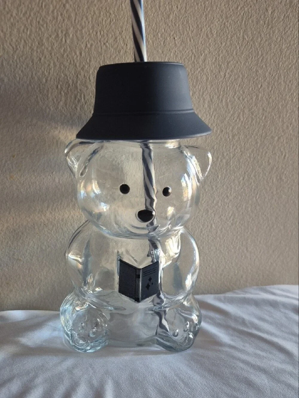 Clear Bear-Shaped Drinking Cup with Gray Lid and Striped Straw
